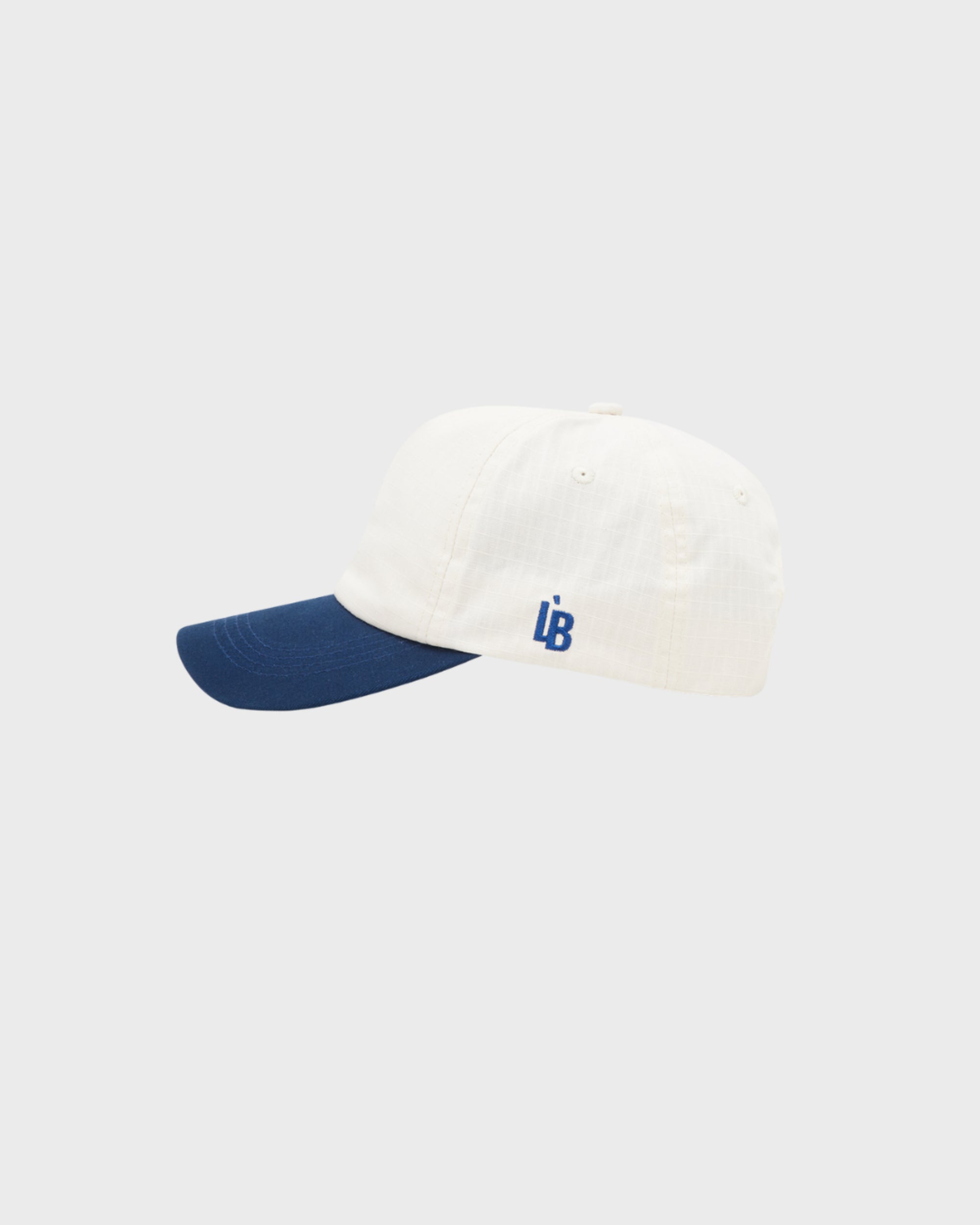 LÈ BAUS 5 PANEL CAP - CREAM/NAVY